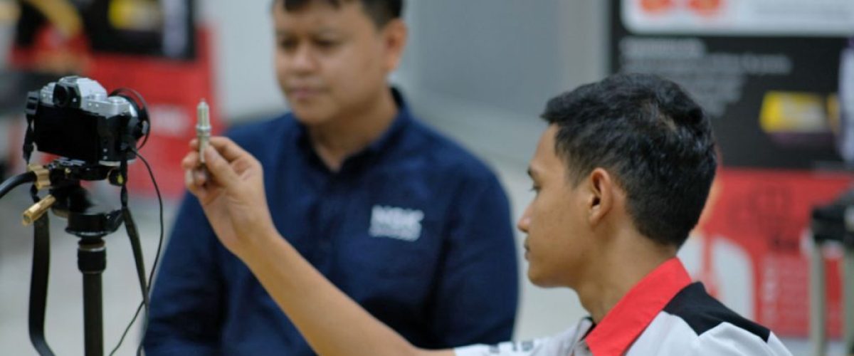 NGK-busi-komunitas-alert